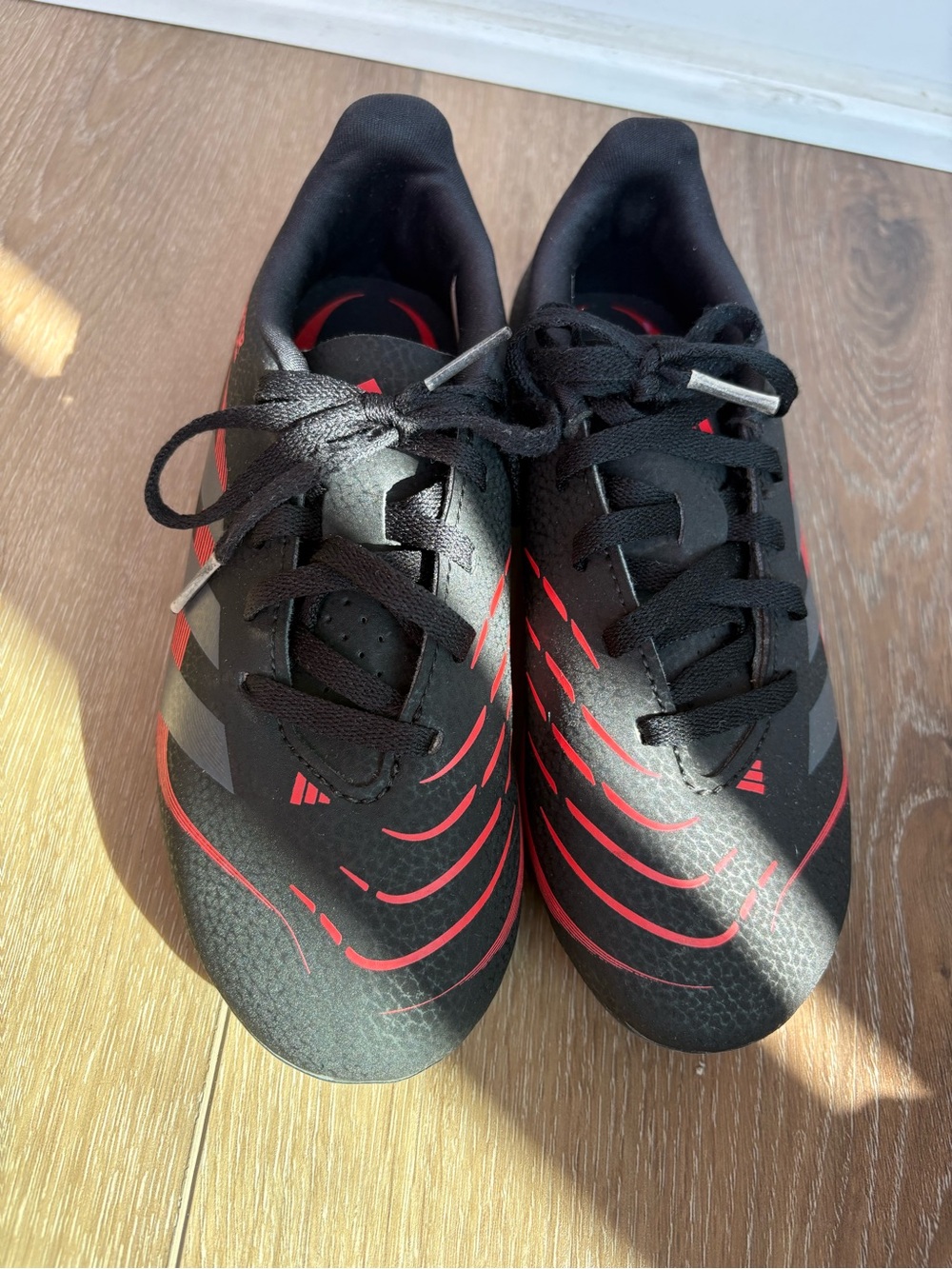 adidas Kids Black and Red Soccer Cleats